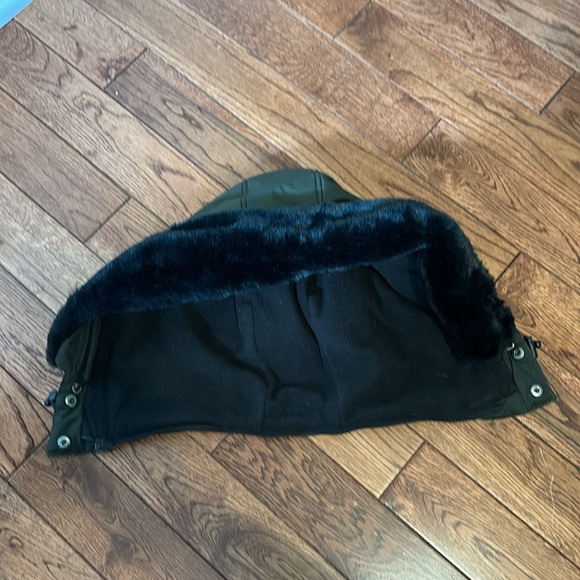 Convertible and cozy warm winter puffer in dark green with black accents - Picture 8 of 10